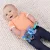 BRIGHT STARTS Játék C gyűrűn szenzoros Stitch Tummy Tumble™ 0m+